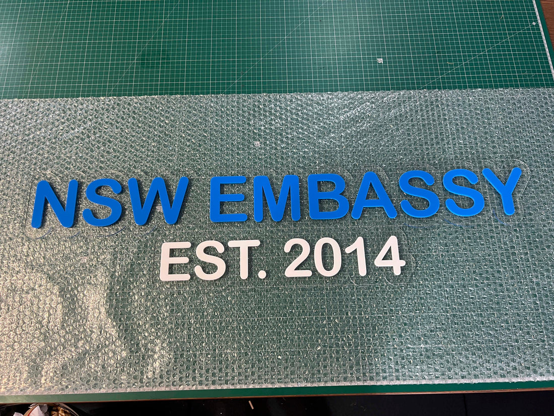 Custom Acrylic plaque with 'NSW Embassy Est. 2014' text 