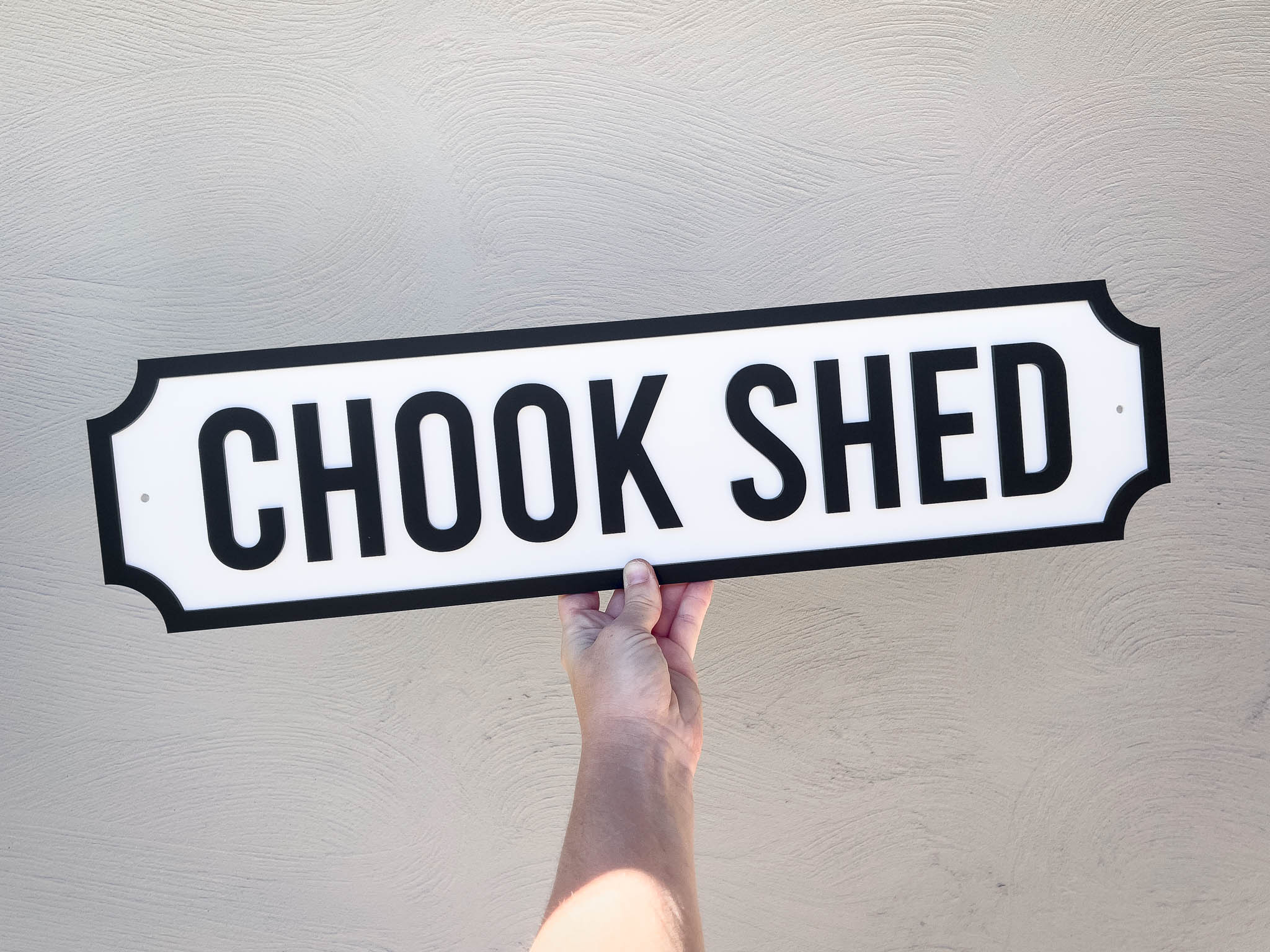 Personalised outdoor 'CHOOK SHED' sign in black and white.