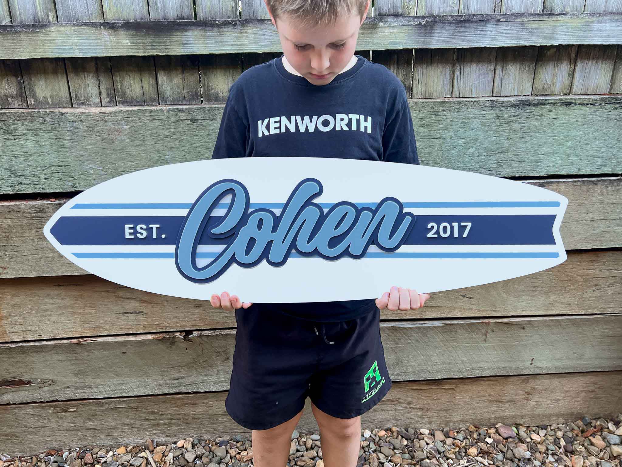 Classic style striped surfboard customised with a child's name 'Cohen' and 'EST. 2017'.