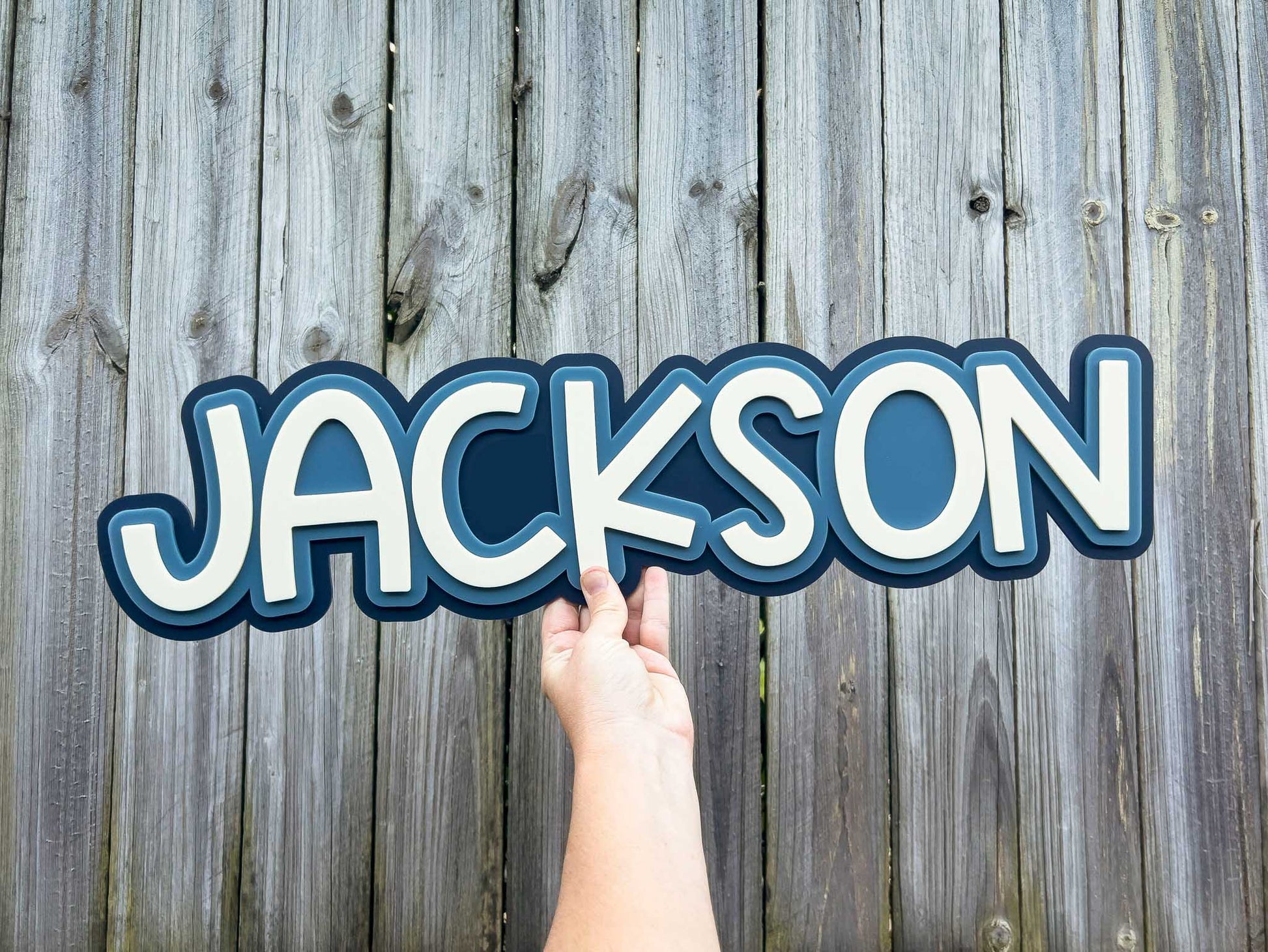 Retro Beachy 3D Acrylic Wall lettering name in blue and beige that says 'JACKSON'.