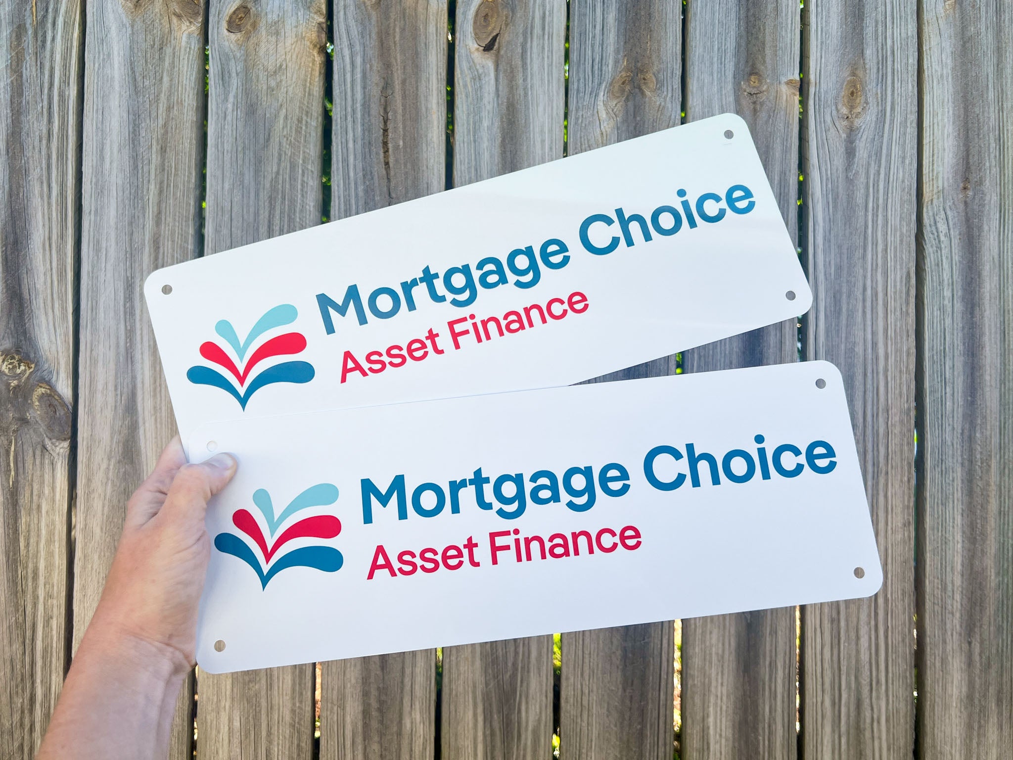 Two gloss logo plates printed with a 'Mortgage Choice' logo.