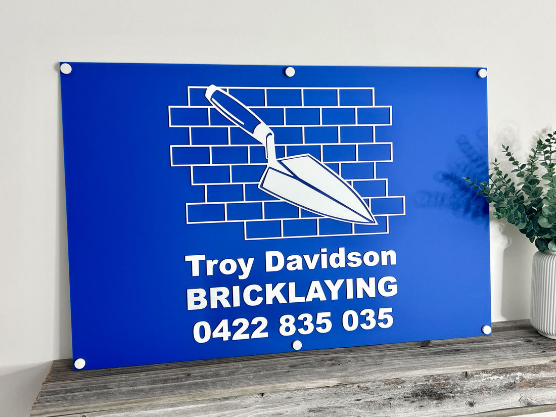 Blue and white 3D acrylic logo sign for Troy Davidson Bricklaying