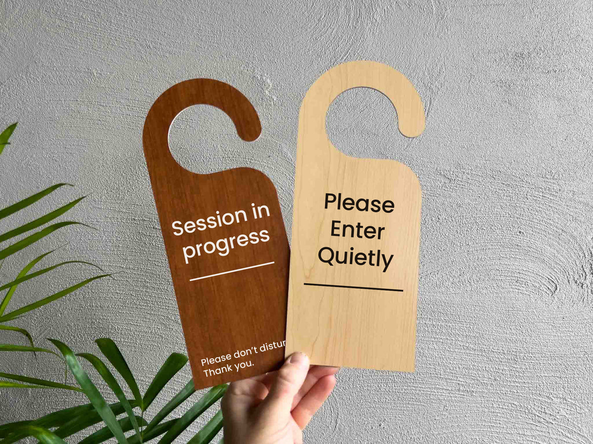Two custom engraved waterproof wood look door hangers that read 'Session in progress' & 'Please enter quietly'.