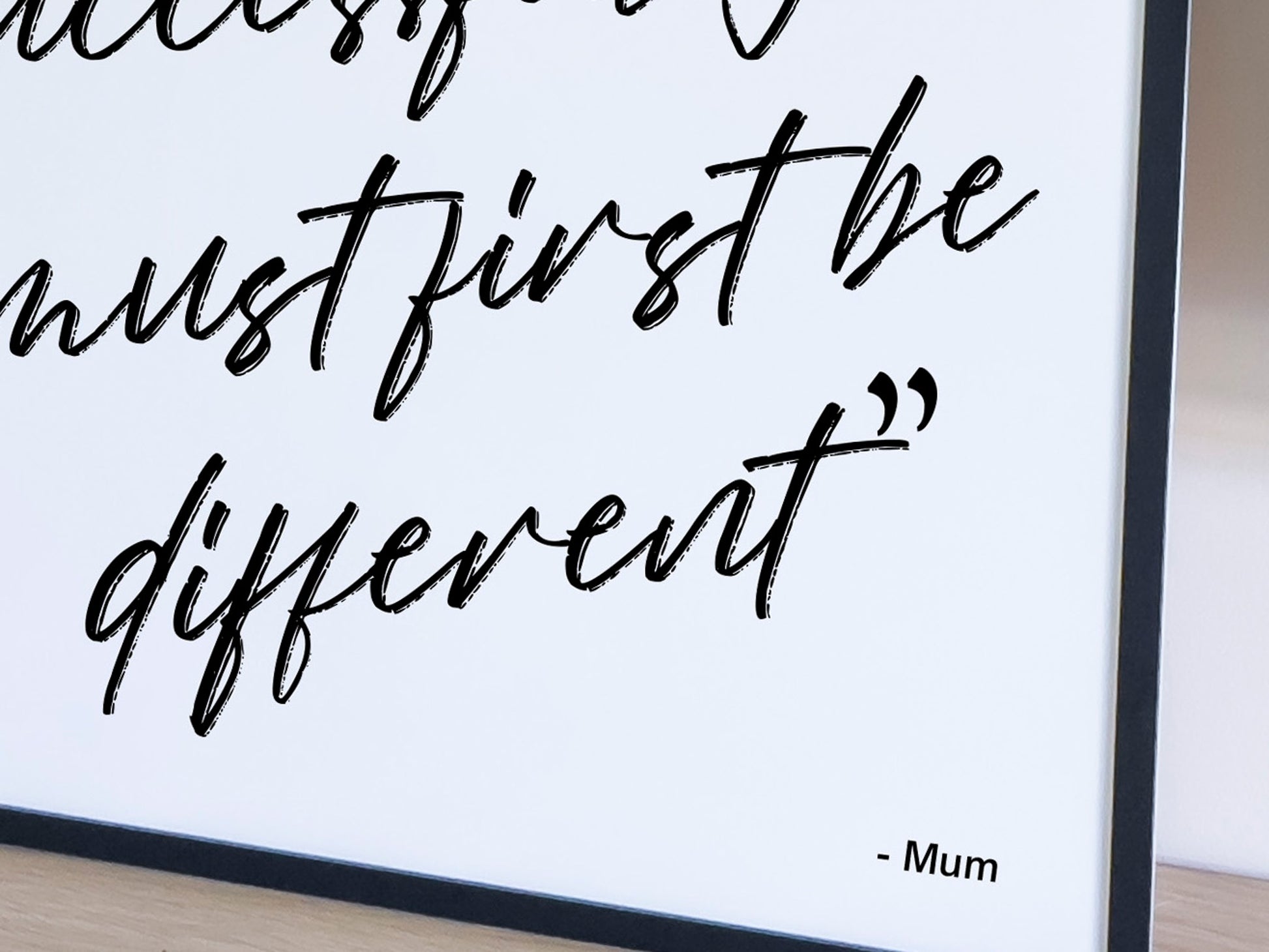 Quote on a white background with black text, 'Success must first be different' - Mum