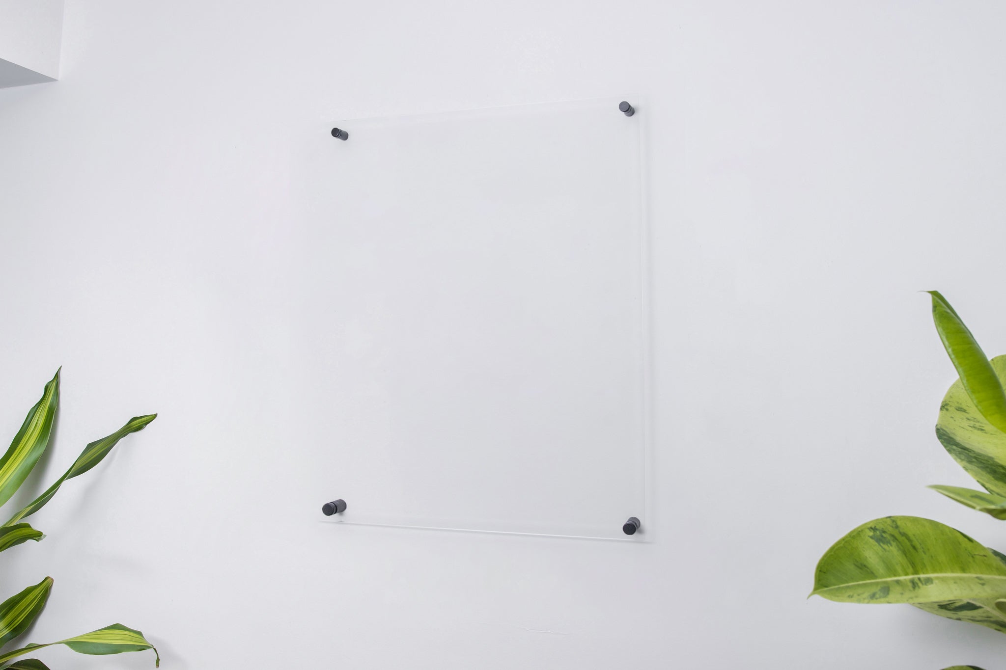 A medium size clear acrylic wall schedule family planner