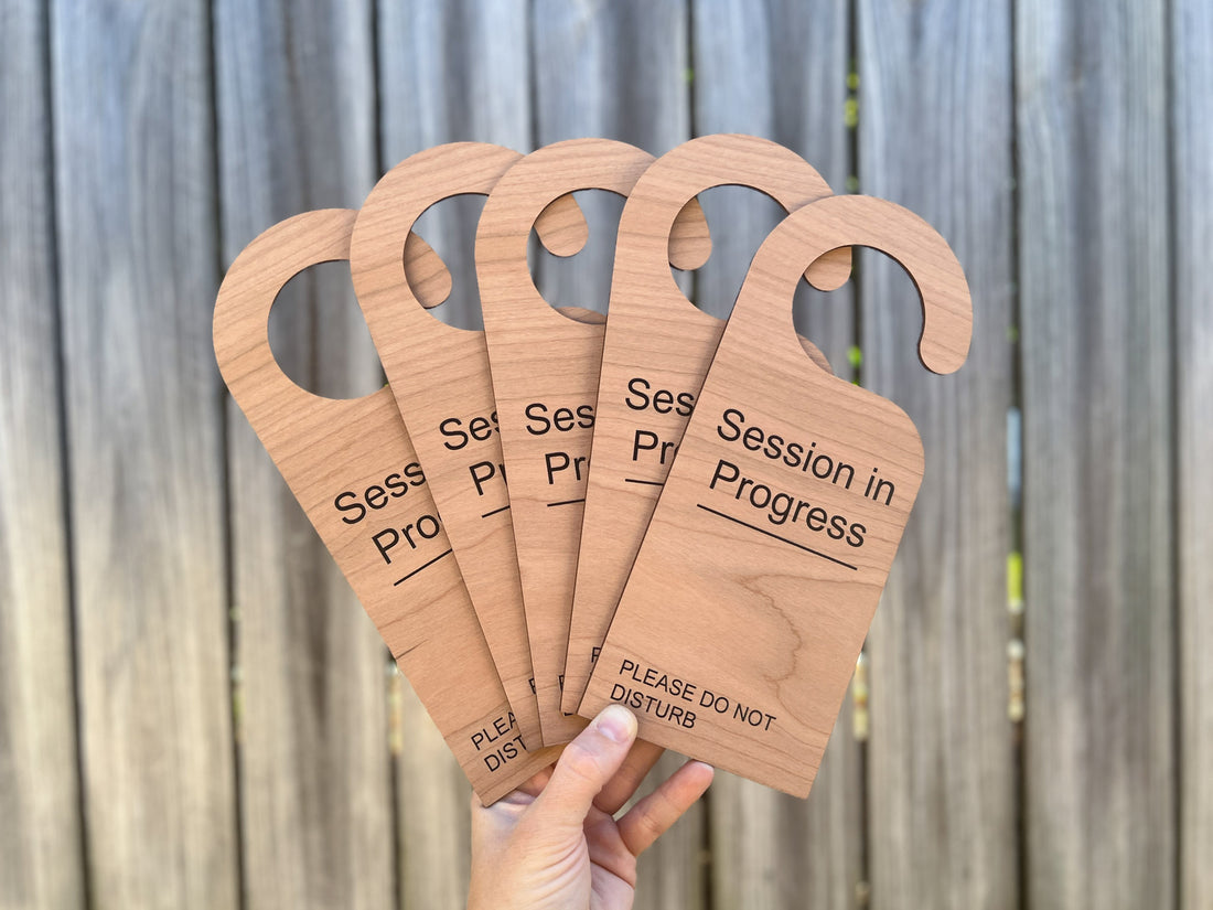 Personalised wooden UV printed timber door hangers for boutique studios and clinics | Coji Designs